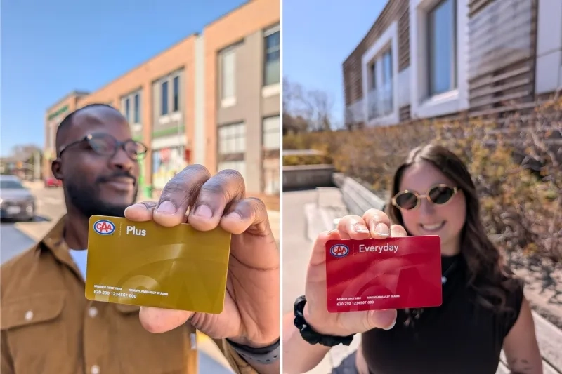 Two people holding CAA Membership