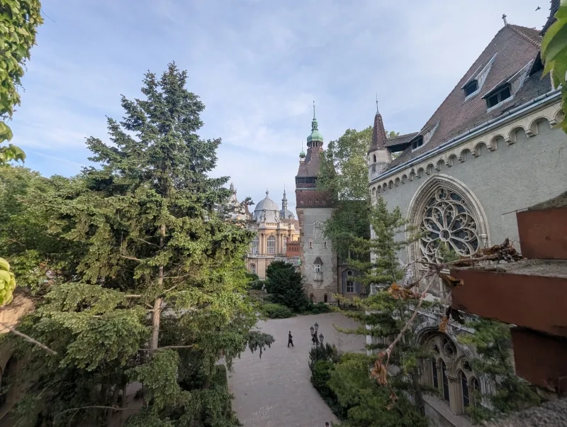 walk through the grounds of the Vajdahunyad Castle