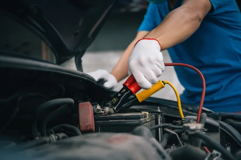 Charging battery car with electricity trough jumper cables.