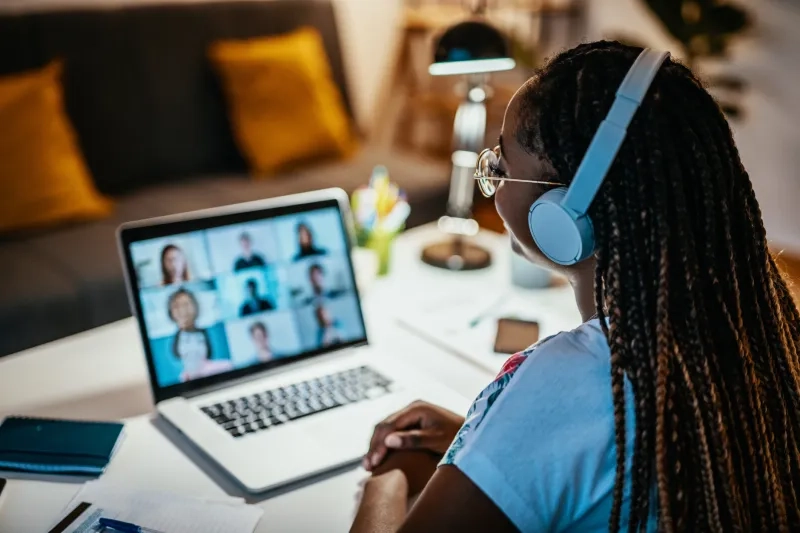 Woman on virtual team meeting