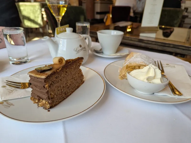 Slice of chocolate cake and apple dessert