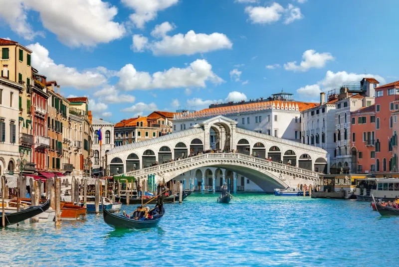 View of the Rialto bridge over the Grand Canal in Venice