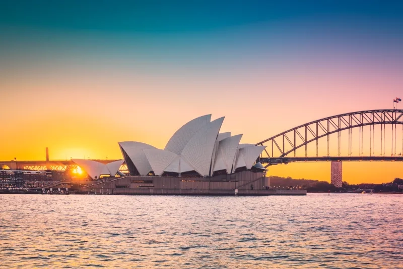 Stunning view of Sydney Opera House with colourful evening sky hues at sunset time