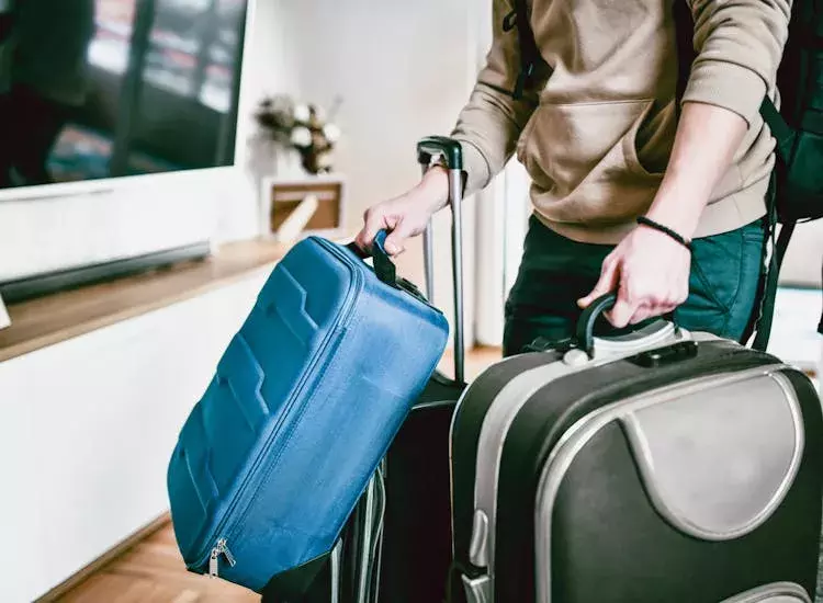 Man carrying luggage 