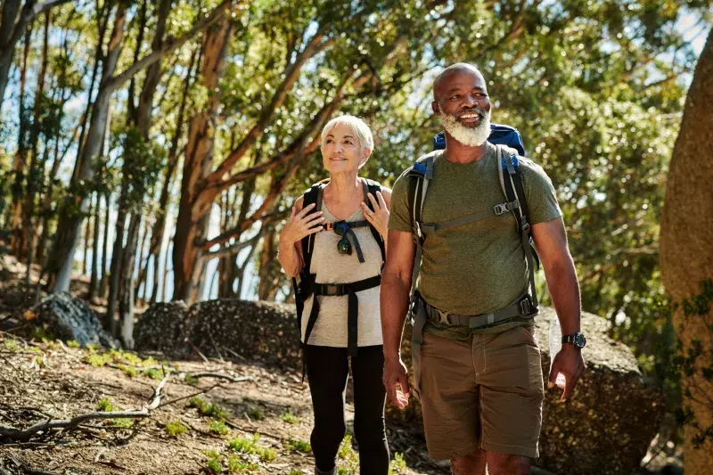 two adults hiking