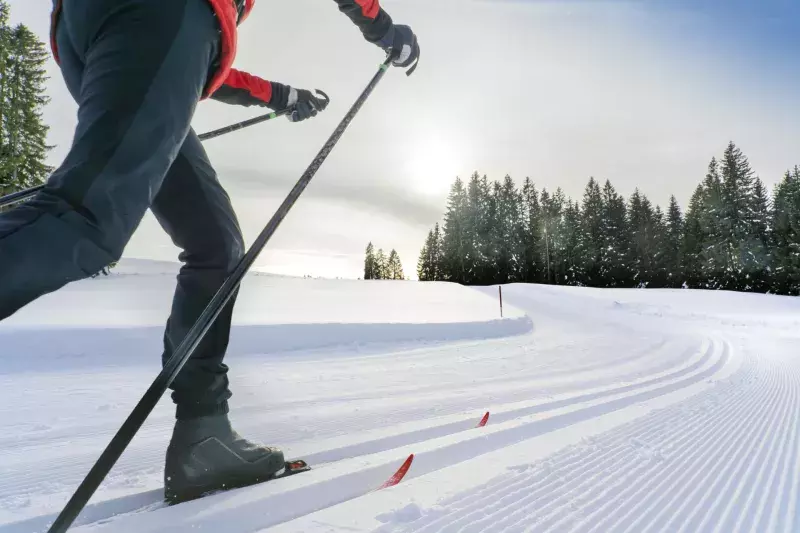 senior woman on cross country ski