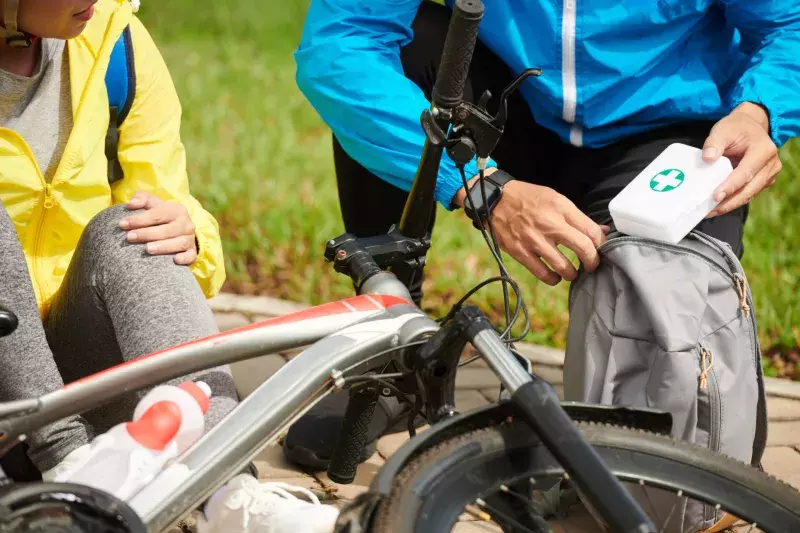 Man Taking out First Aid Kit