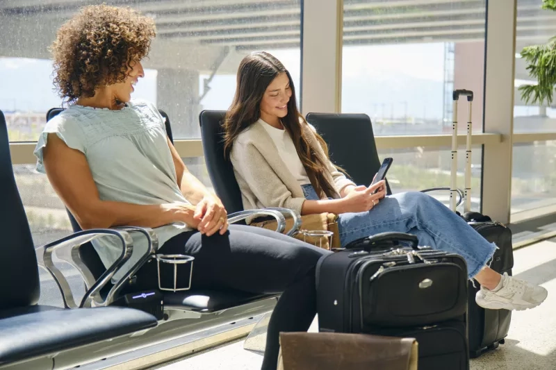 Young Women Travelers in an Airport