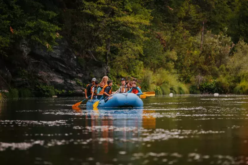 Rafters make a splash on calm waters.